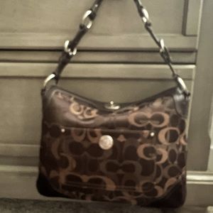 Brown Coach purse.